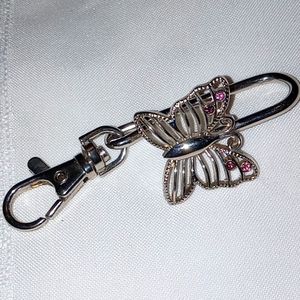 Butterfly keychain with purple jewels
